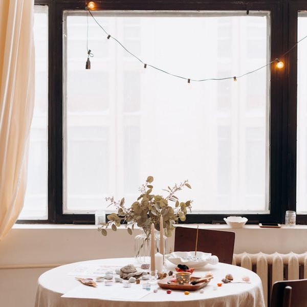 A woman in a flowing yoga pose, radiating calm and positive energy.